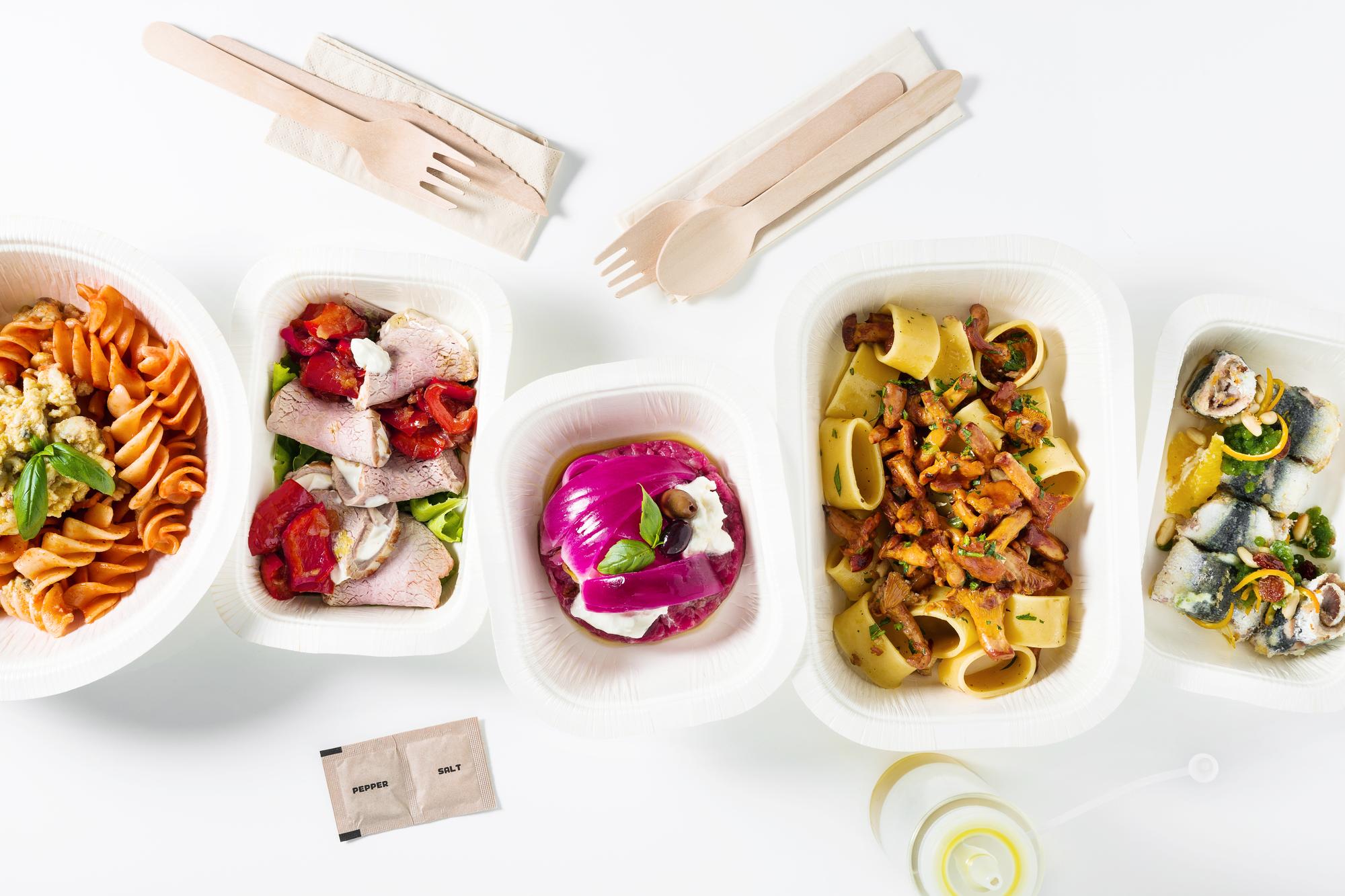 Selection of three meal kits on a table